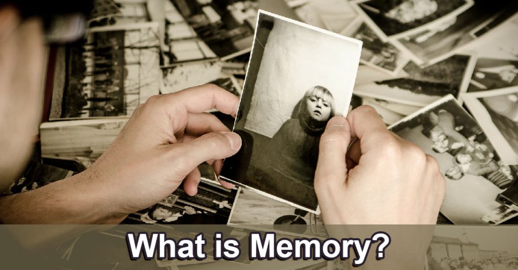 What is memory? A person looking through old photographs.